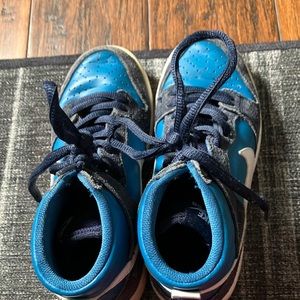 Blue, black and white high top Nikes